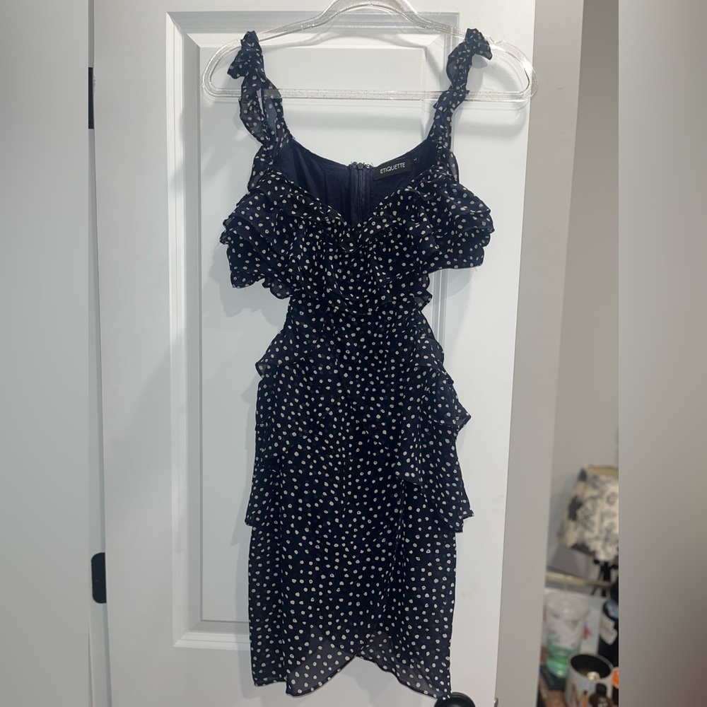etiquette polka dot cut out ruffle dress
